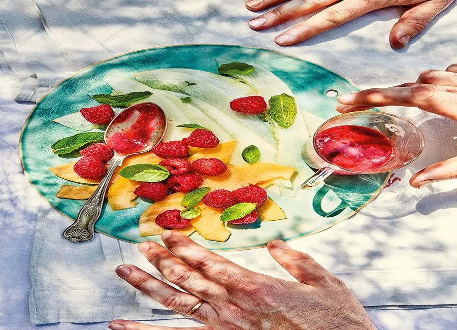 Carpaccio de melon et framboises aux herbes