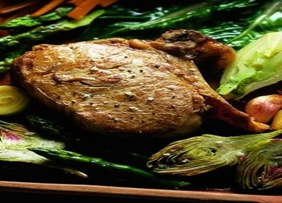 Côtes de veau à la jardinière de légumes printaniers