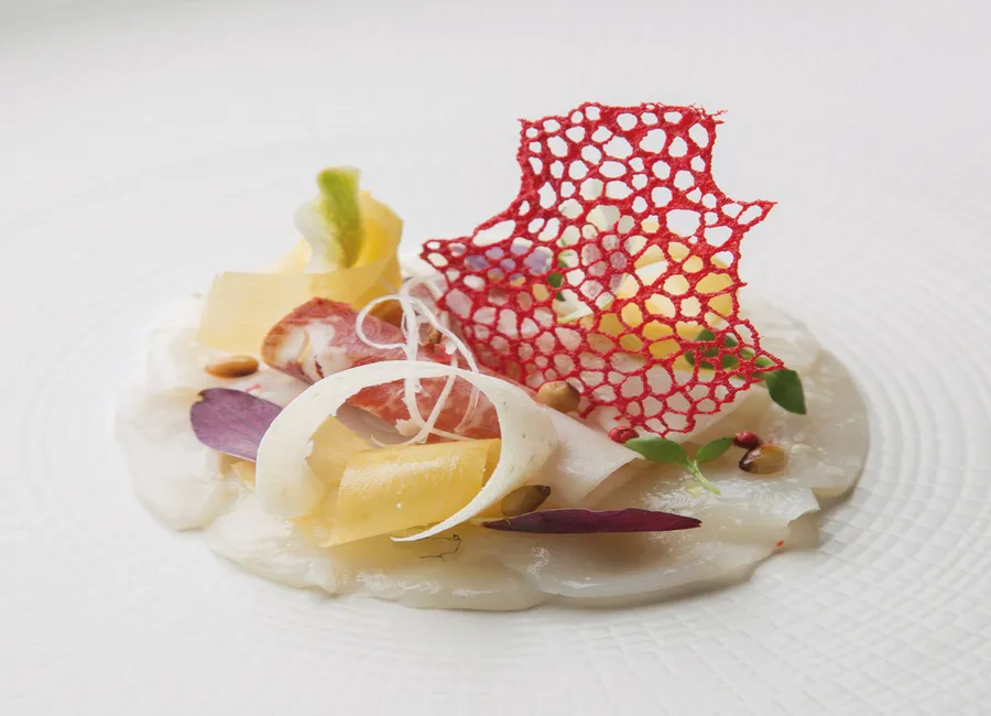 Carpaccio de saint-jacques vinaigrette d’agrumes