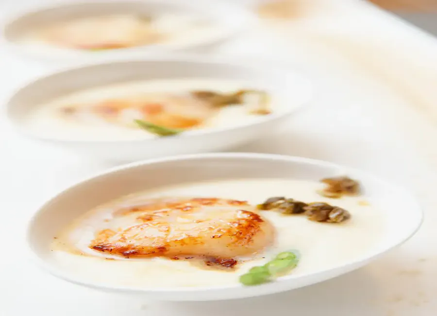 Noix de saint-jacques à la crème d 'ail