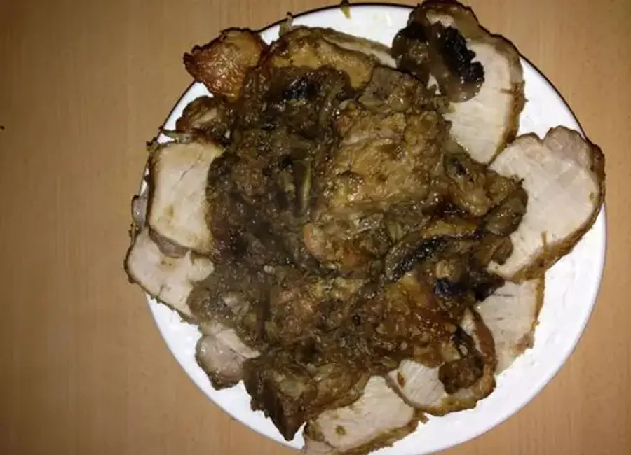 Rôti de porc aux oignons