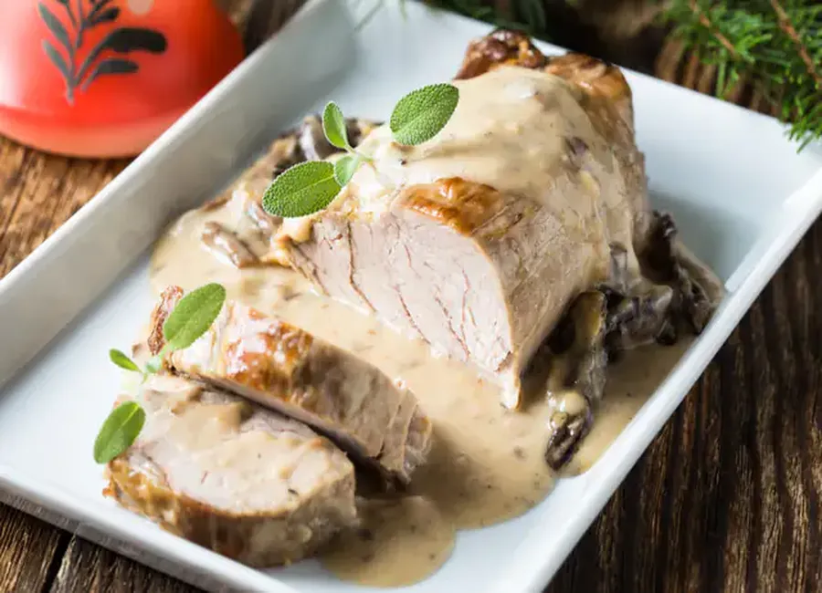 Rôti de porc aux oignons et au lait