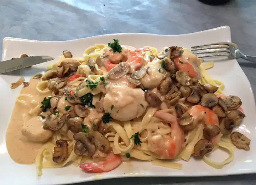 Scampis et noix de st jacques au parmesan et martini blanc