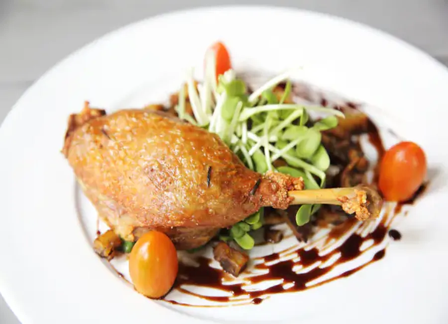 Canard à l'orange et aux tomates