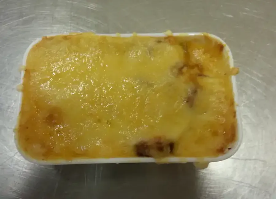 Cassolette de saucisses, sauce béchamel