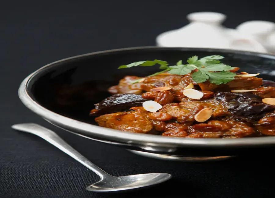 Tajine d'agneau aux pruneaux et aux amandes
