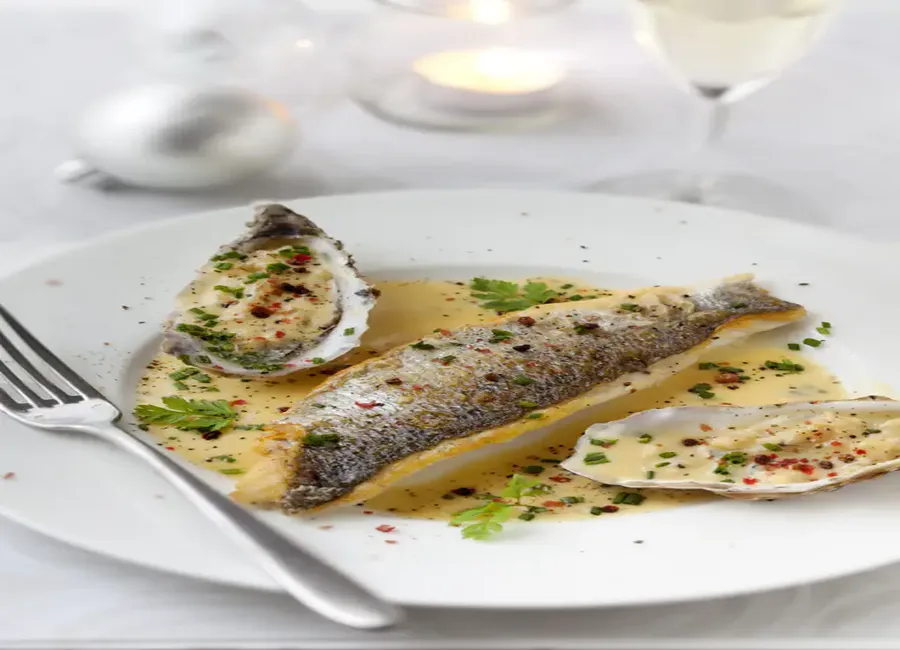 Filets de bar, beurre blanc aux huîtres et champagne