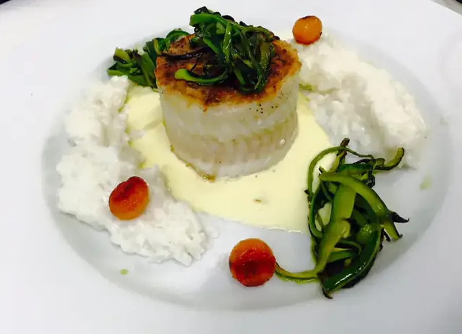 Mousseline de merlan aux petits légumes en dariole de sole