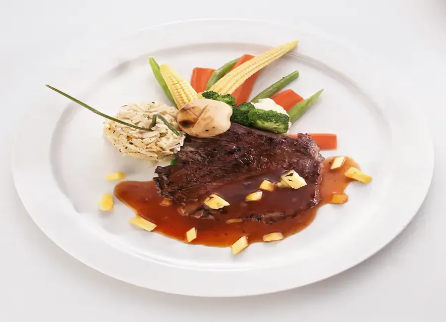 Pavé d' autruche au vin