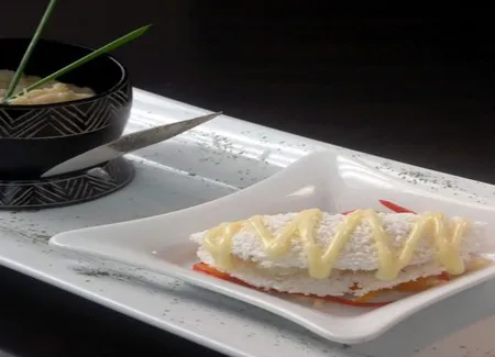 Brandade de tucunaré* au lait de coco et crêpe dentelle de tapioca aux crustacées et coeur de palmier frais, confiture au piment