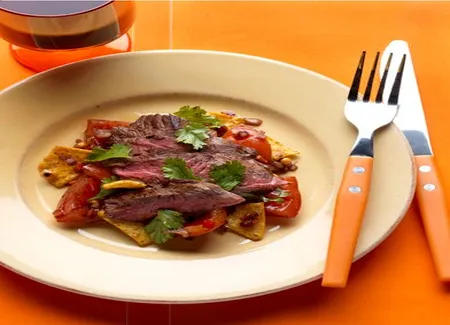 Chili rubbed skirt steak, tortilla fattoush