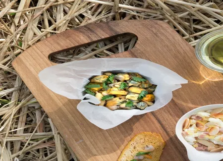 Coquillages en vinaigrette aux herbes