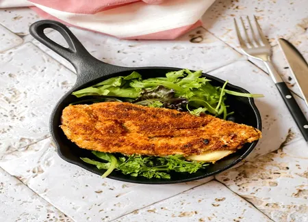 Cordon-bleu de poulet au bacon et à la raclette