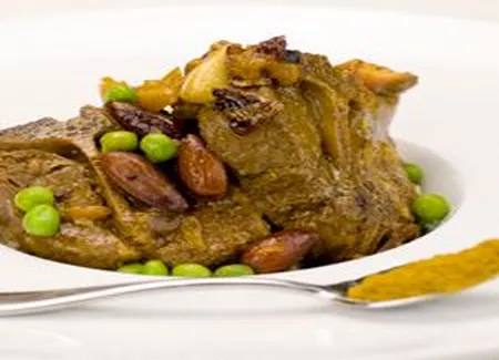 Côtes dagneau au curry et pois vert
