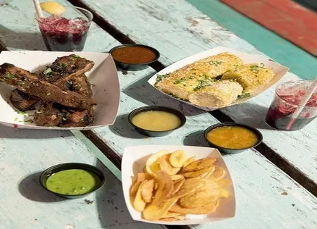 Côtes de porc à la jerk et maïs épicés