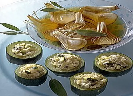 Courgettes farcies sur confit d'oignons