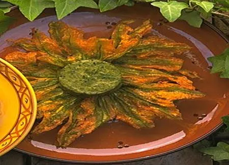 Fleurs de courgette frites et purée de courgette à l'anchois