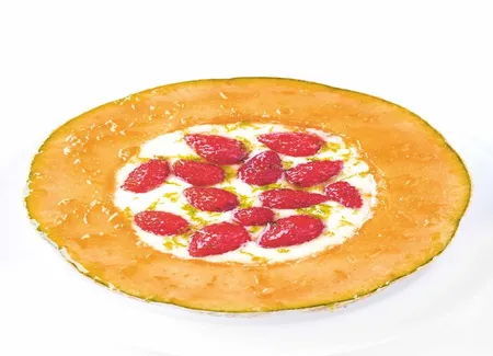 Melon à la crème et fraises des bois