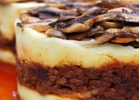 Parmentier de veau aux tomates séchées et à la tombée de champignons