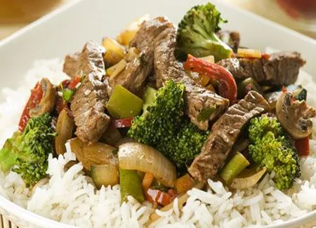 Sauté de veau au gingembre et à la coriandre