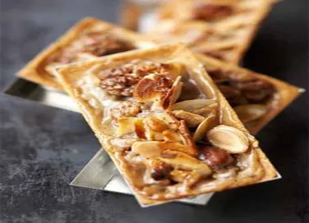 Tartelettes sablees au miel et aux fruits secs