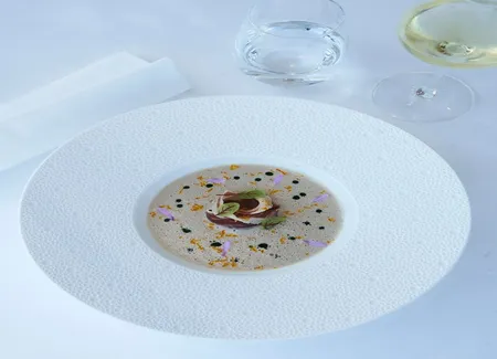 Velouté de cèpes, orange et jambon