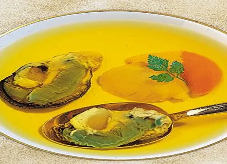 Consommé d'huîtres et de saint jacques