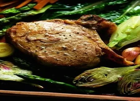 Côtes de veau à la jardinière de légumes printaniers
