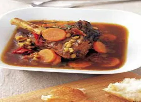 Souris d'agneau, sauce à l'orange et romarin