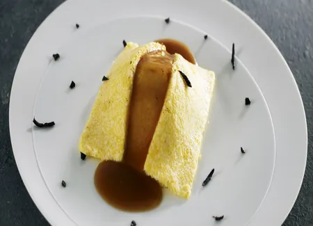 2Mm de polenta, cèpe du pays au couteau, jus de volaille parfumé au genièvre et poussière de truffe