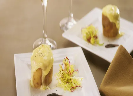 Pommes de terre coulantes de mont d'or au vin jaune