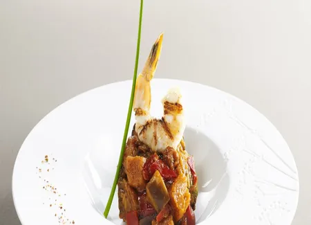 Tajine de légumes grillés et gambas royales au grill