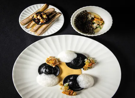 Raviole de boudin noir et coquillages