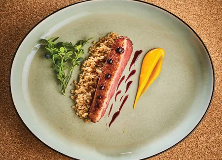 Canard aux myrtilles des bois pilaf de freekeh