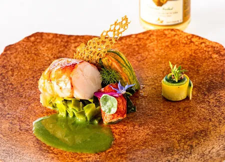 Ris de veau et homard rôti aux sucs de crustacé