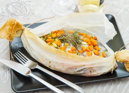 Filet de colin sous son lit de carottes au cooking chef