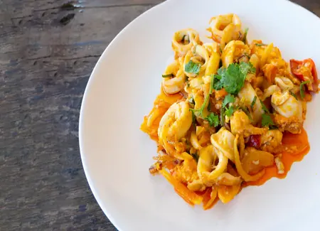 Fricassée de calamars à l’italienne au cooking chef