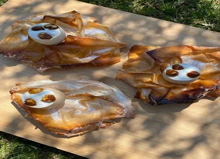 Oeufs tièdes au chocolat, noisettes caramélisées et crème citronnée de pierre hermé