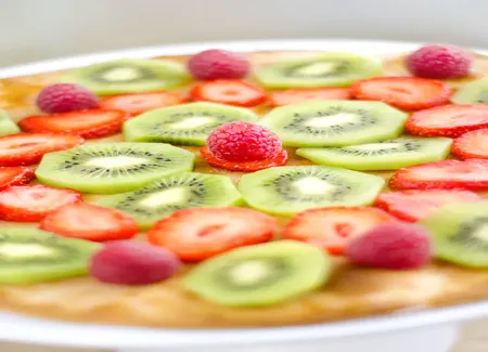 Pizza sucrée pêches framboises