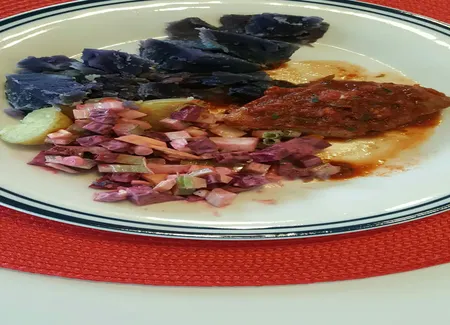 Tranches de porc sauce au vin et à la tomate