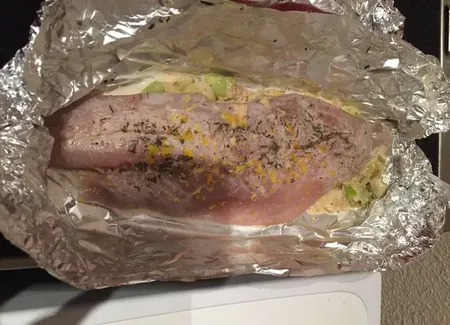 Filet de lieu noir en papillote de poireaux aux agrumes