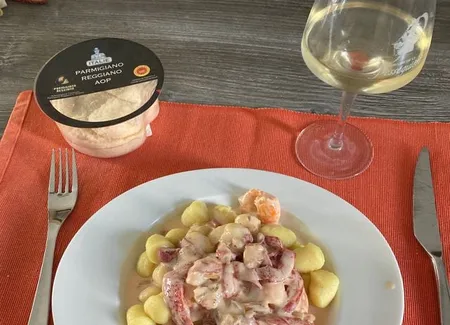 Gnocchis aux crevettes flambés au whisky