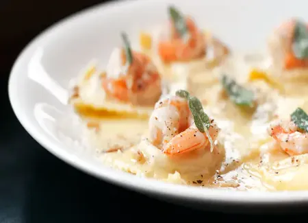 Ravioles aux crevettes et poireaux sauce boursin