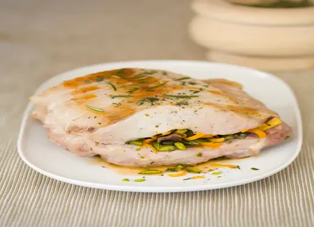 Rôti de porc farci aux pistaches et à l'orange