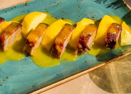 Magrets de canard aux mangues épicées
