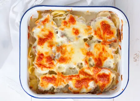 Gratin d'oeufs au curry et au jambon
