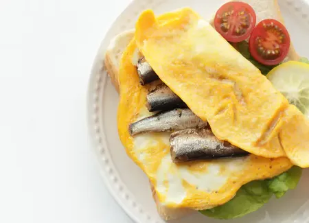 Omelette et ses sardines grillées