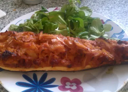 Courgettes farcies et sauce aux oignons