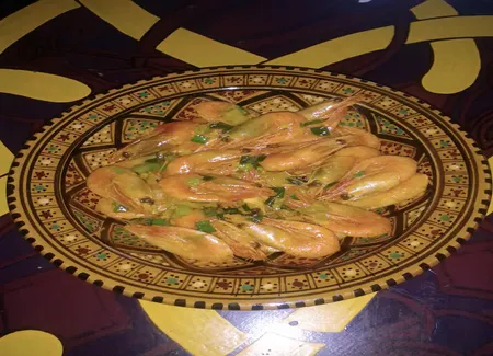 Crevettes poêlées au curry et à l'ail