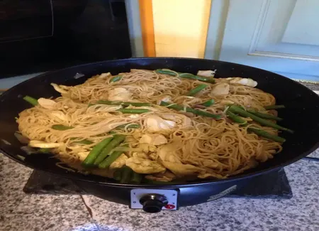 Wok de poulet au curry et lait de coco